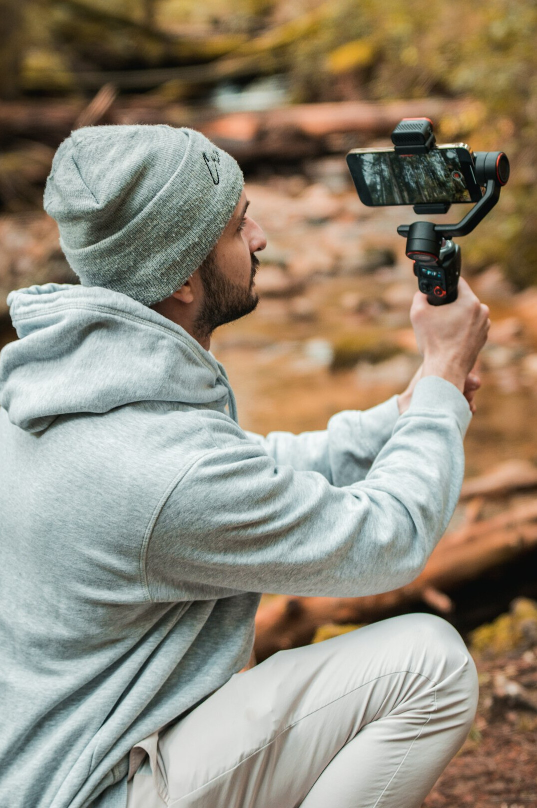 British camera operator holding a professional video camera on set